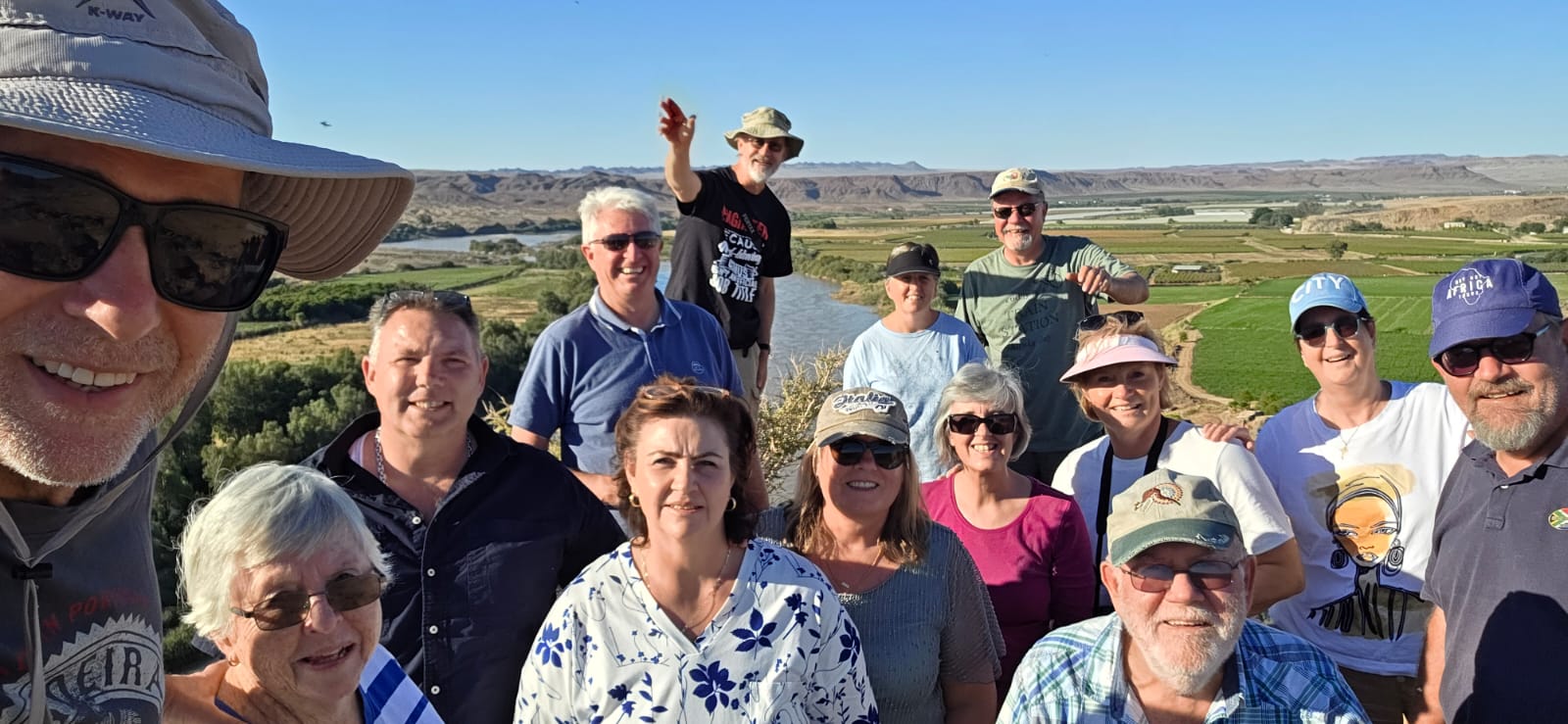 Why Not Africa Tours group at a viewpoint