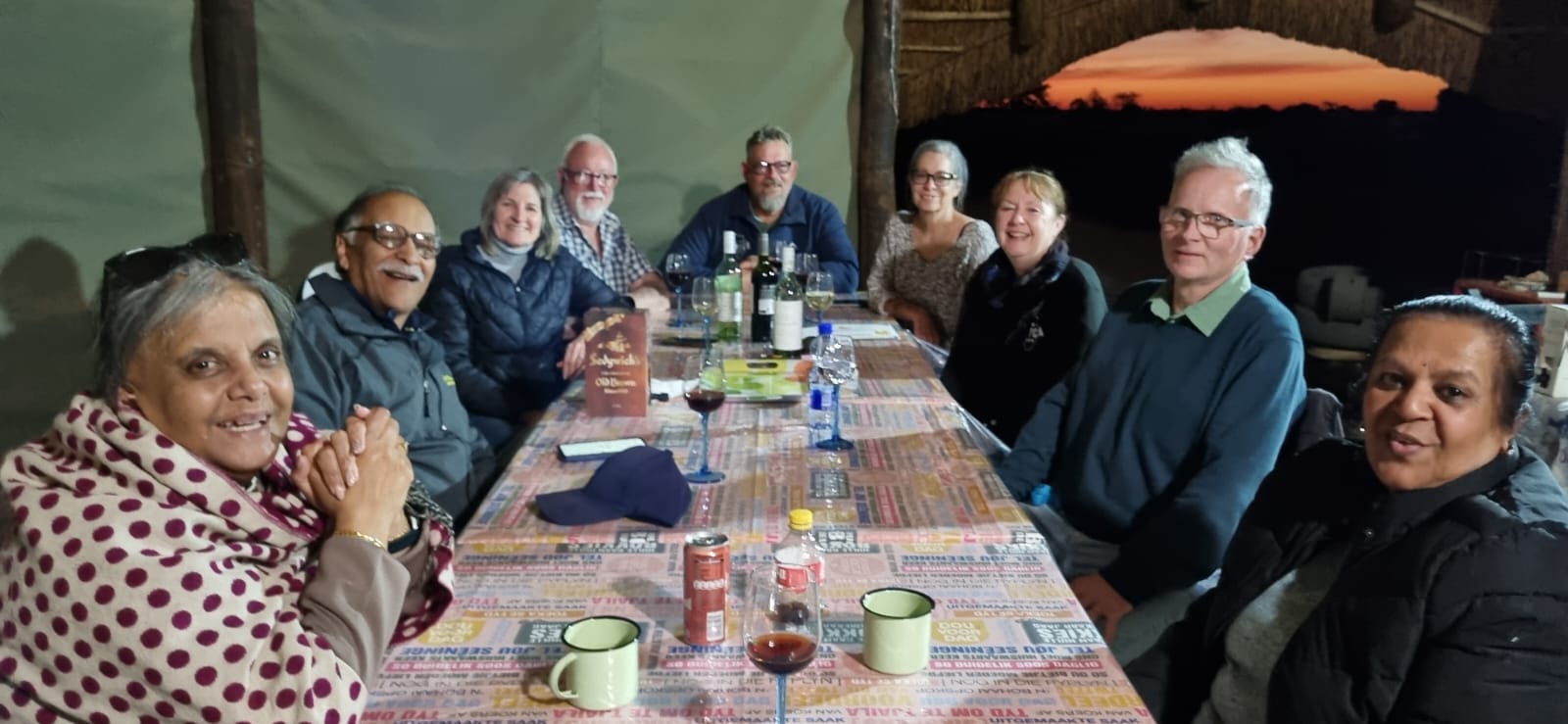 Why Not Africa Tours guests sharing a meal together